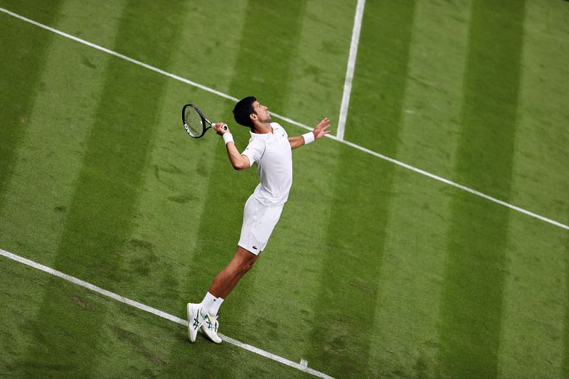 Novak Djokovic serves