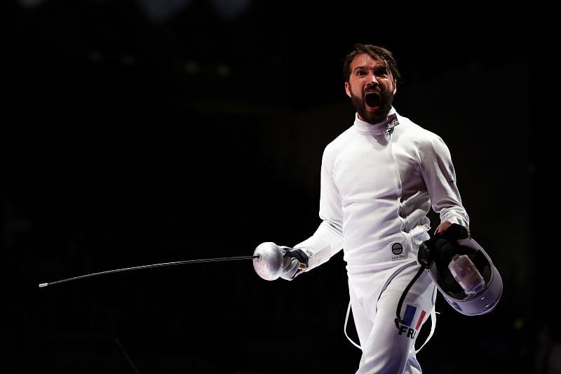 Romain Cannone of Team France celebrates a win in men&#039;s individual epee at Tokyo Olympics 2020
