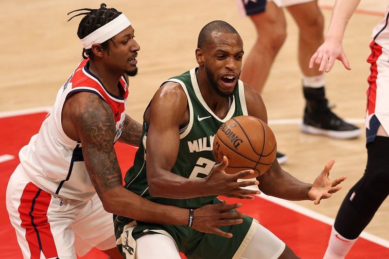 Bradley Beal (#3) guards Khris Middleton (#22).