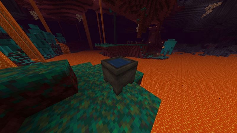 A cauldron is able to hold water while in the Nether (Image via bugs.mojang)