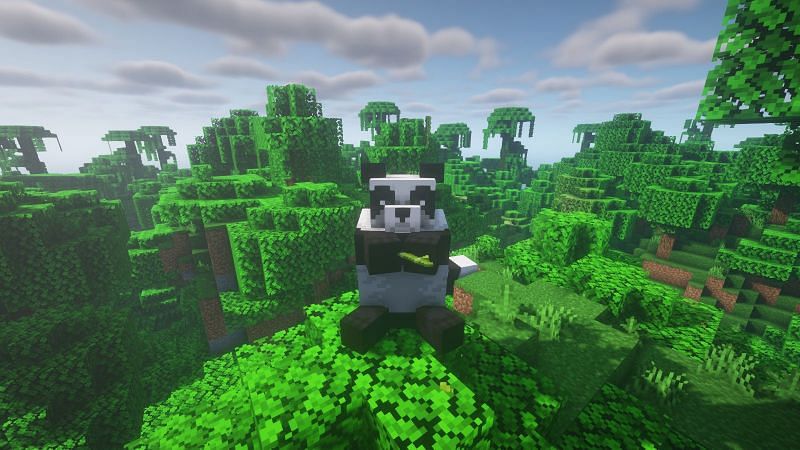 A panda eating bamboo (Image via Minecraft)