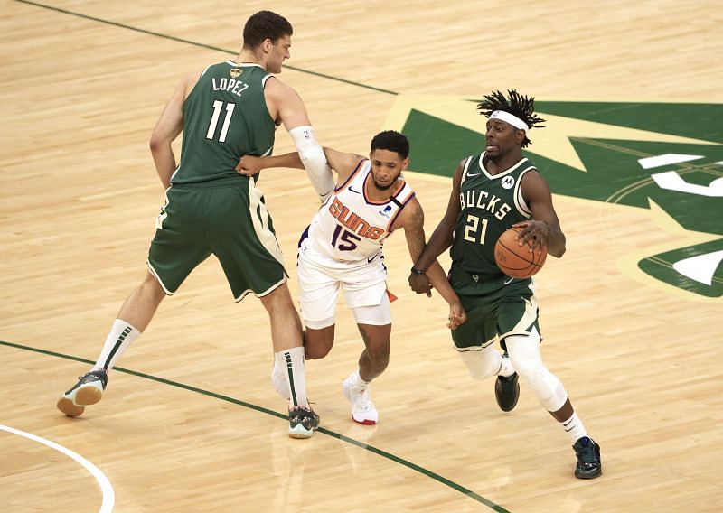 Jrue Holiday #21 drives to the basket against &lt;a href=&#039;https://www.sportskeeda.com/basketball/cameron-payne&#039; target=&#039;_blank&#039; rel=&#039;noopener noreferrer&#039;&gt;Cameron Payne&lt;/a&gt; #15.