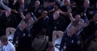 Watch: Conor McGregor is all smiles and in a celebratory mood while being stretchered out at UFC 264 despite a broken leg