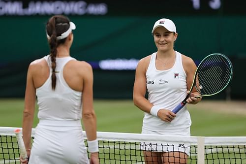 Ajla Tomljanovic and Ashleigh Barty at the net