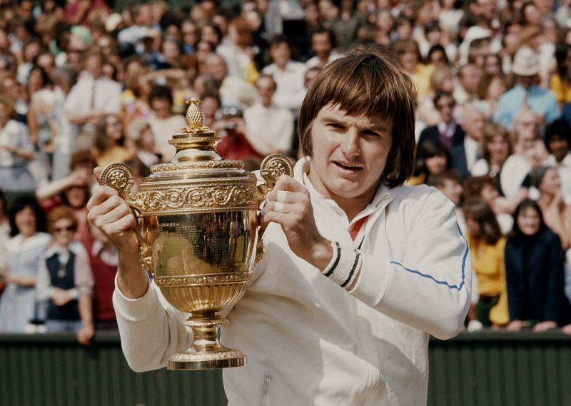 Jimmy Connors poses with the Wimbledon title in 1974