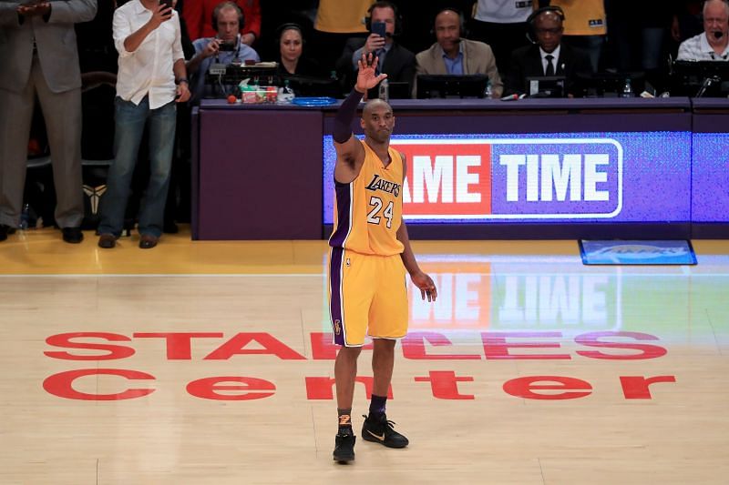 Kobe Bryant after his farewell match waves a good-bye to the fans