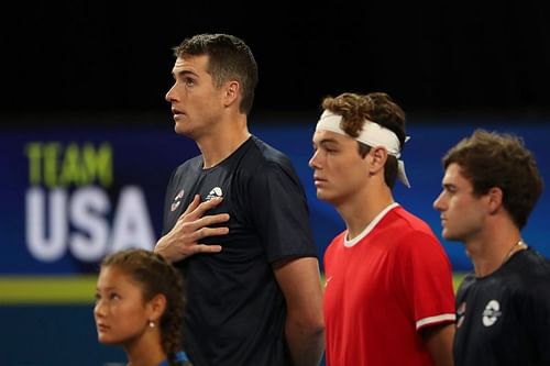 John Isner (L) and Taylor Fritz