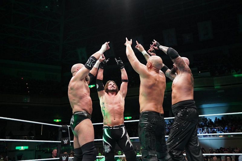 Triple H with Doc Gallows, AJ Styles, and Karl Anderson