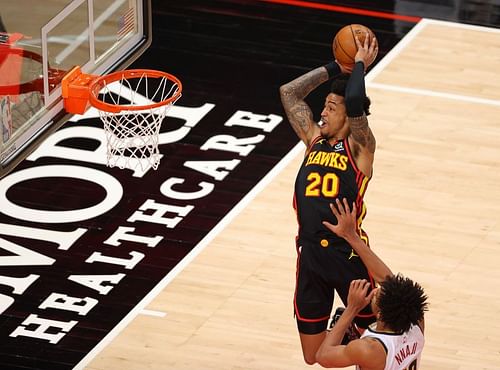 John Collins (#20) of the Atlanta Hawks