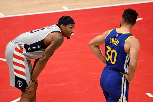 Bradley Beal #3 in conversation with Stephen Curry #30