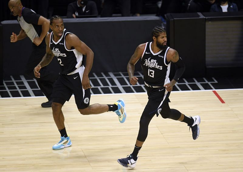 LA Clippers duo Kawhi Leonard (left) and Paul George (right) in action during the 2021 NBA playoffs