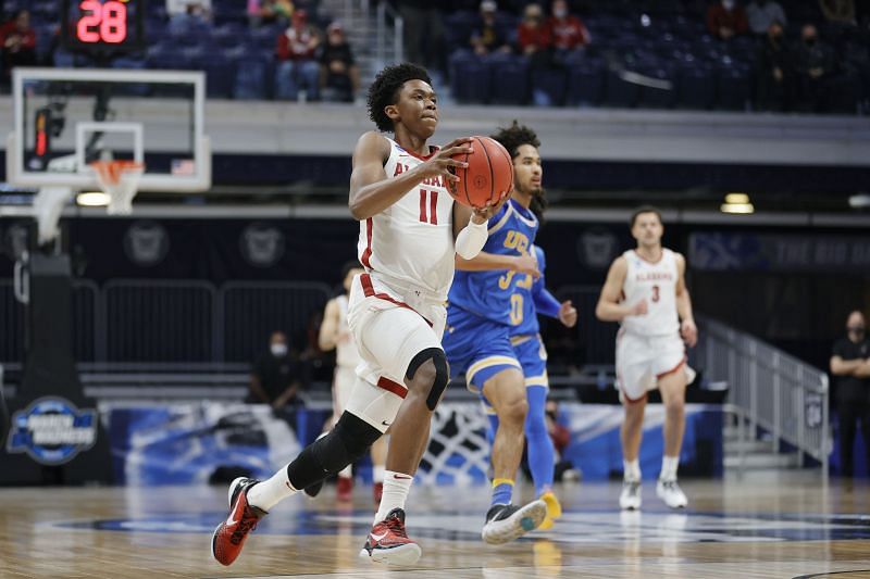 Joshua Primo #11 of the Alabama Crimson Tide drives toward the hoop.