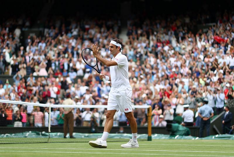 Roger Federer soaks in the applause after beating Cameron Norrie