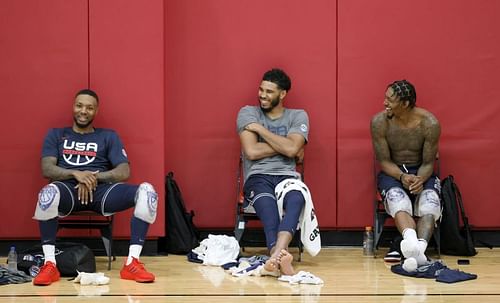 Damian Lillard #6, Jayson Tatum #10 and Bradley Beal #4 talk after practice.