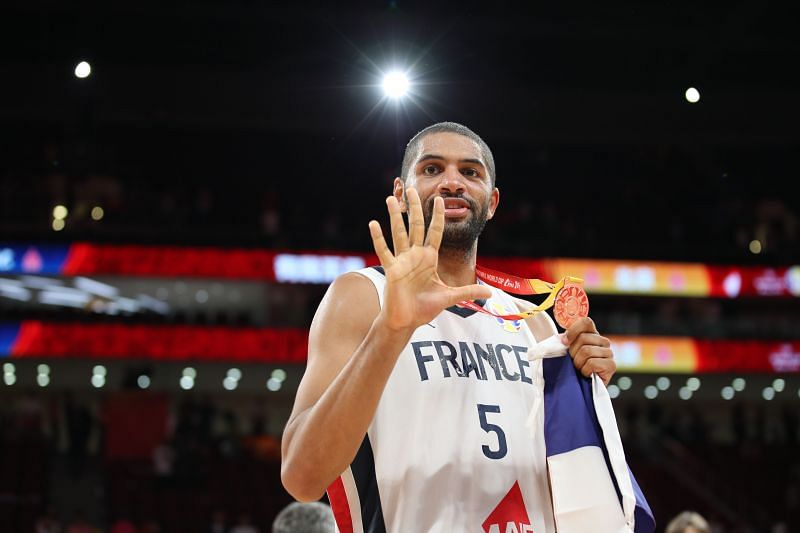Nicolas Batum )#5) of France celebrates his team's victory during the Cup ceremony after the FIBA World Cup 2019.