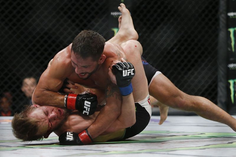 Chad Mendes delivers ground and pound on Conor McGregor.