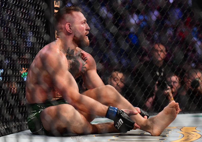 Photos from Conor McGregor's leg injury at UFC 264