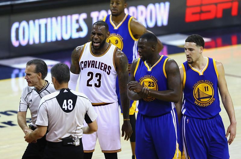 LeBron James #23 of the Cleveland Cavaliers and Draymond Green #23 of the Golden State Warriors.