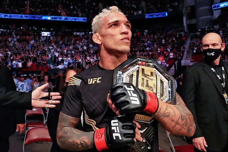 Charles Oliveira with the UFC lightweight title