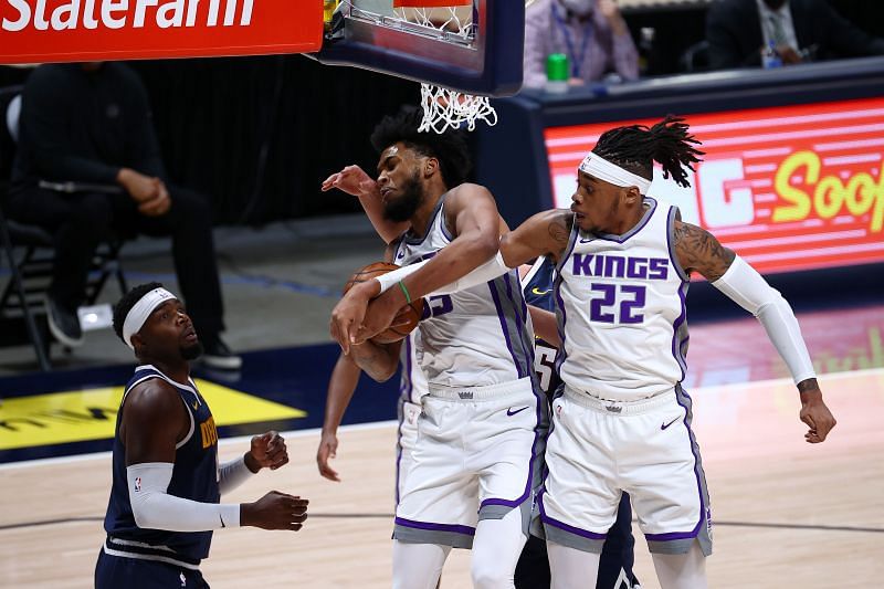 Marvin Bagley III #35 and Richaun Holmes #22 of the Sacramento Kings jump for a rebound.