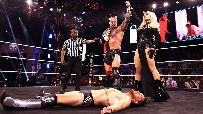 Karrion Kross with Scarlett after retaining the NXT Title at NXT TakeOver: In Your House