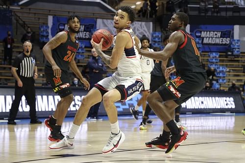 James Bouknight #2 looks to shoot against Darryl Morsell #11