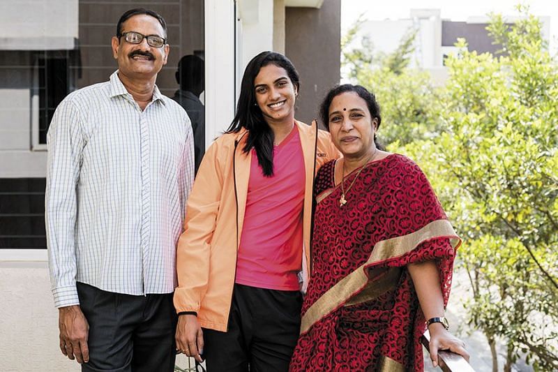 PV Sindhu with her parents PV Ramana (left) and P Vijaya