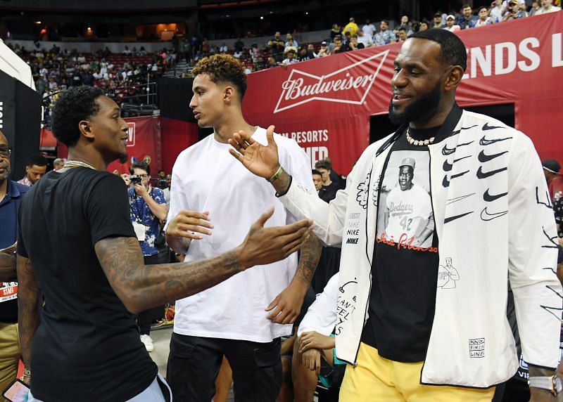 Kyle Kuzma (center) of the LA Lakers, along with LeBron James (right) before an NBA Summer League game