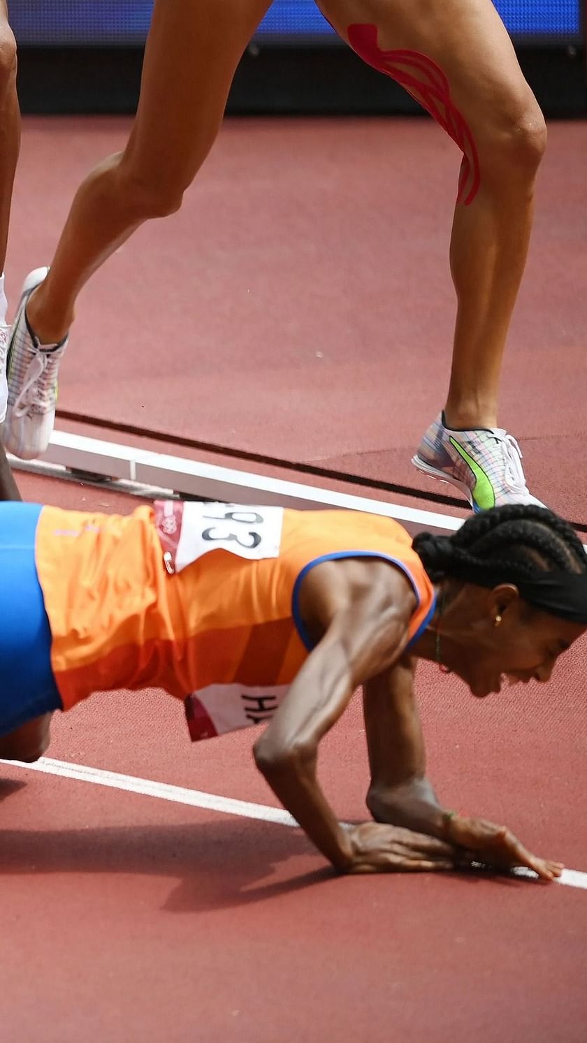 Dutch runner Hassan falls, gets up and wins 1,500 meter heat