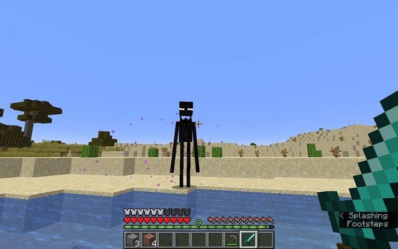 An enderman attempting to reach a player (Image via Minecraft)