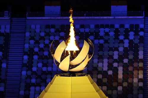 The Olympic Flame is seen during the Opening Ceremony of the Tokyo 2020 Olympic Games at Olympic Stadium