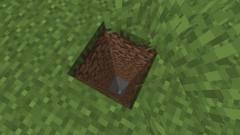 Digging straight down could be deadly (Image via Minecraft)