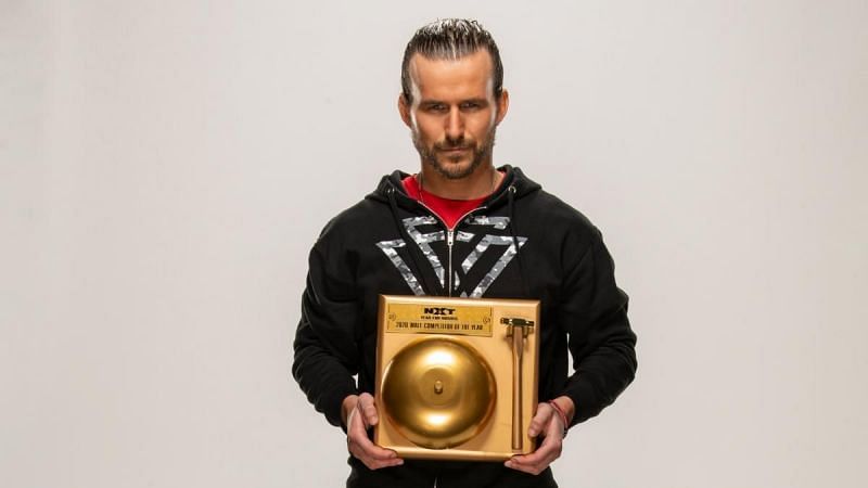 Adam Cole with his year-end NXT award