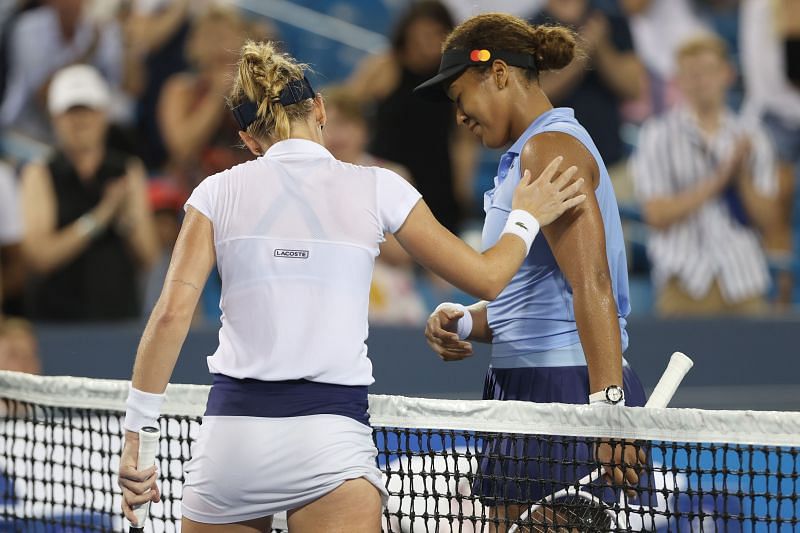 Jil Teichmann (L) &amp; Naomi Osaka shake hands after their match at Cincinnati