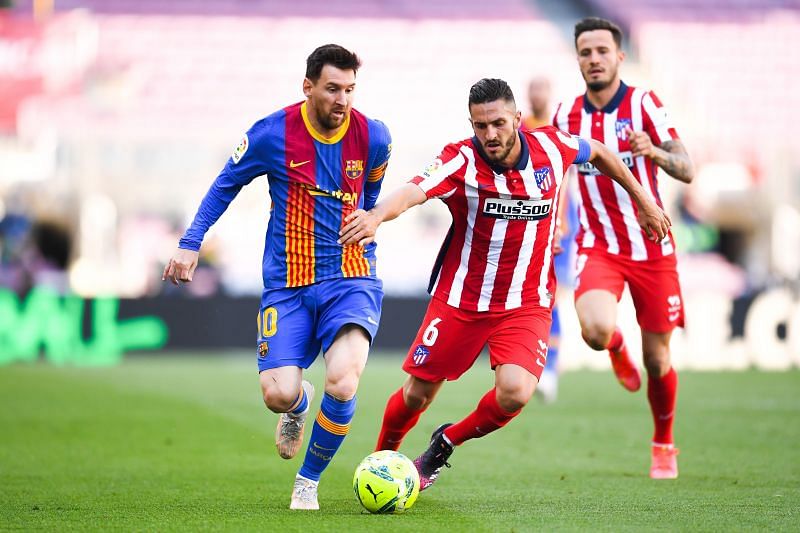 Lione Messi (left) and Koke (right)