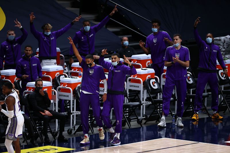 Sacramento Kings celebrate a basket during a game,