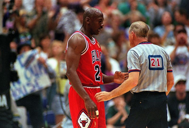Michael Jordan (#23) talks to the referee.