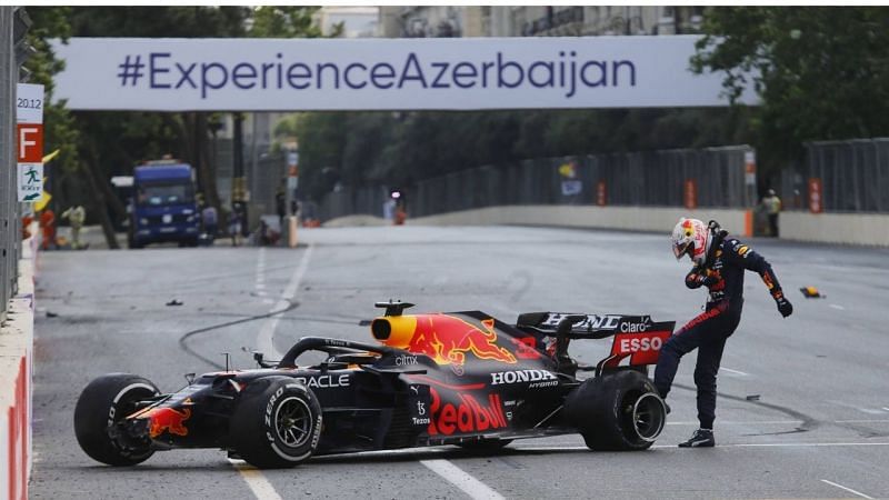 Verstappen kicks the tire that took him out of the 2021 Azerbaijan Grand Prix.