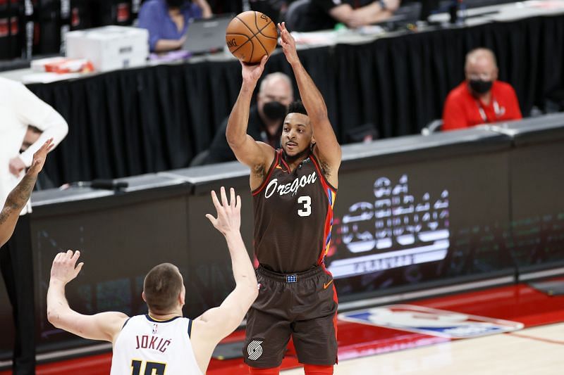 CJ McCollum (right) in action