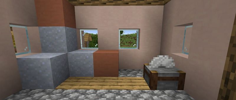 The stonecutter block in a village (Image via Minecraft )