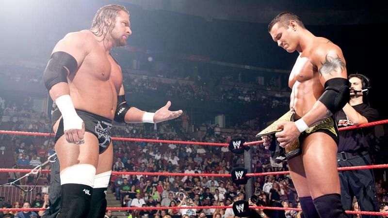 Triple H and World Heavyweight Champion Randy Orton on RAW in 2004