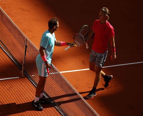 Rafael Nadal (L) and Sebastian Korda