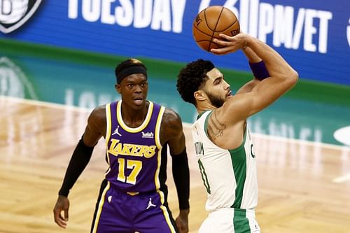 Dennis Schroder watches on as his new teammate Jayson Tatum takes a shot