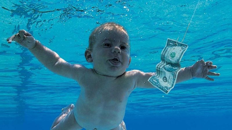 The baby from Nirvana&#039;s album cover is now suing the band and Kurt Cobain&#039;s estate (Image via Twitter/consequence)