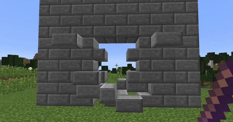 Hidden doors and entrances are a fun and appealing way to hide an obvious entry point to a structure (Image via Mojang)