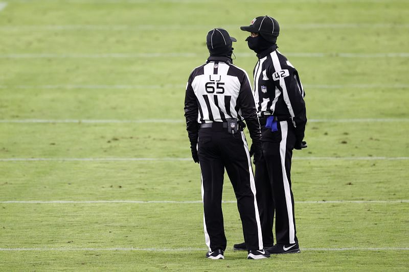 Referees in a Dallas Cowboys v Baltimore Ravens game