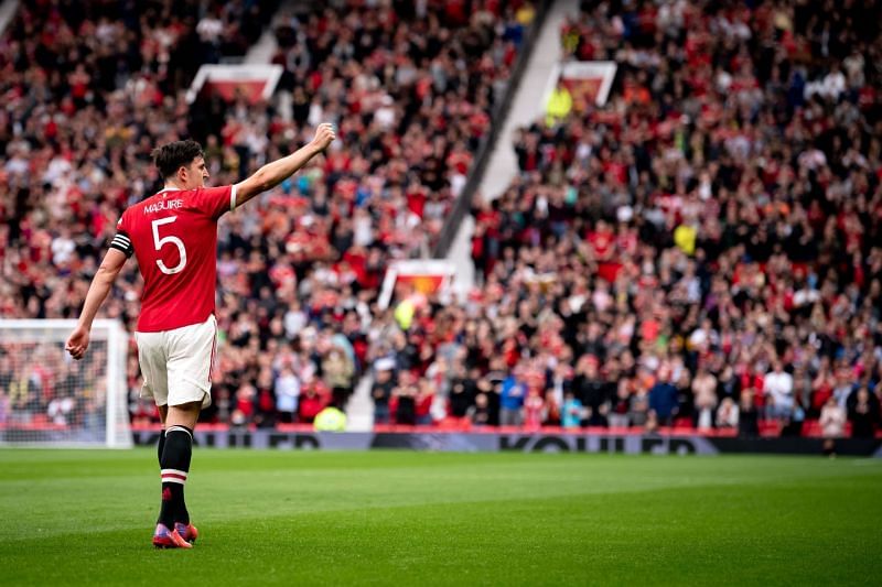 Manchester United captain Harry Maguire celebrates after scoring a header against Everton.