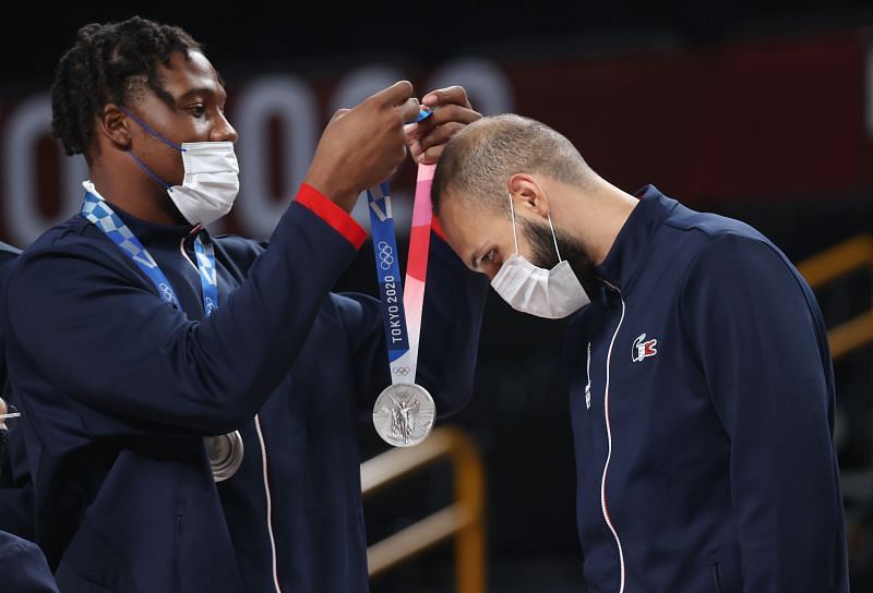 Guerschon Yabusele of Team France presents Evan Fournier with his silver medal