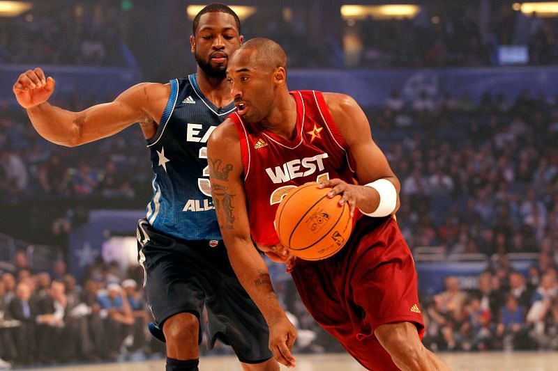 Dwyane Wade and Kobe Bryant playing against each other during an NBA All-Star game.