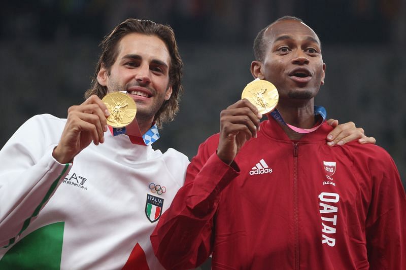 Gianmarco Tamberi and Mutaz Barshim with their gold medals at the Tokyo Olympics 2021